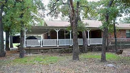 $285,500
Secluded home, 3-4 wrap porch. Large barn-shop, 2 wells, a pond and creek