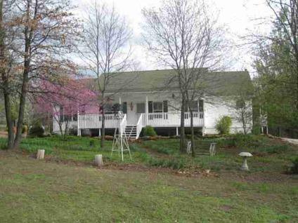 $289,900
This 4 Bedroom 3 Bath home is a country paradise on a park like setting with a