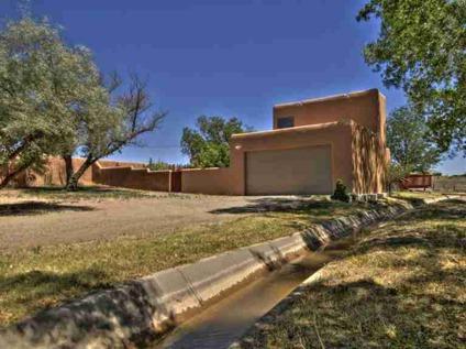 $299,000
Santa Fe 3BR 2BA, This private adobe gated residence is