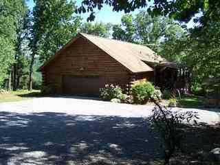 $299,900
This log and stone river view home has end of the road seclusion and over 31
