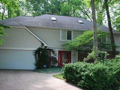 $300,000
4 BR/2.5BA on beautiful wooded lot!