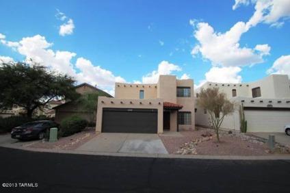 $309,900
This gated Four BR, 2 1/Two BA home backs up to natural desert providing stunnin