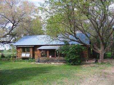 $319,000
Log home with pond, barn & outbuildings