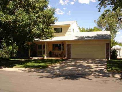 $319,750
Denver Four BR 1.5 BA, Backing to the Highline Canal with a