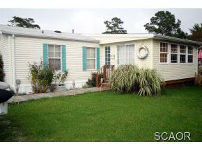 $319,900
Ocean View, This bright & cheerful 2 BD/2BA canal front home