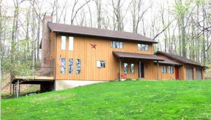 $325,000
Custom Cedar Colonial Home on 3.20 Acres & Just a Minute from Downtown