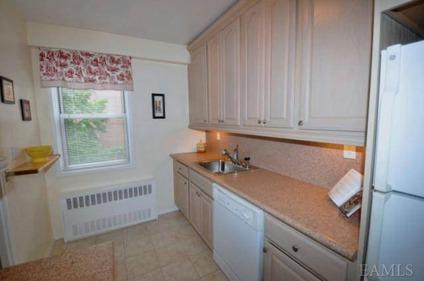 $330,000
Scarsdale Two BA, This corner Two BR co-op offers sunny