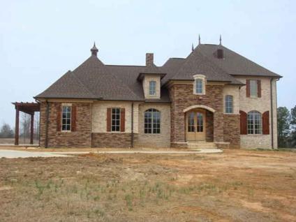 $345,000
Corinth 4BR 3BA, French Country home boasts stone/brick