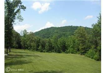 $349,900
Set high on Moonshine Mt, this lovely home has gorgeous views in all directions.