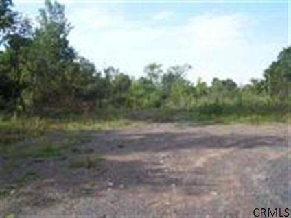 $34,900
Troy, Just over 1/2 acre triangular building lot with sewer