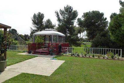 $360,000
3 Bedroom / 2 Bathroom House with Golf Course View