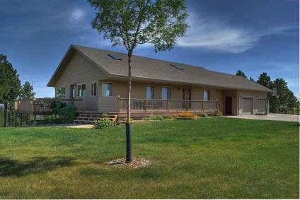 $369,900
This 11+ acre home has panoramic views of the Black Hills & Mt Rushmore!