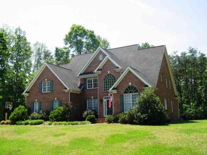 $395,000
Greensboro 4BR 3.5BA, Stately brick home in The Crossing
