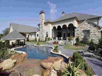 $3,800,000
South Tulsa mansion in gated Wenmoor
