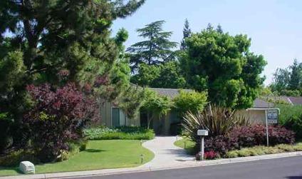 $415,000
Fresno 3BA, Traditional Sale! Walls of glass in the Charming