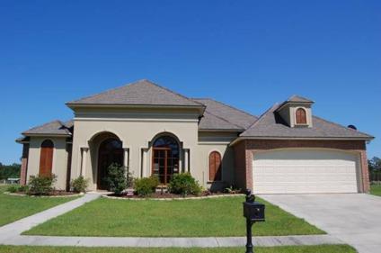 $429,900
This stunning home lies in a gated community, directly on a private canal.