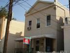 $449,000
Property For Sale at 9016 97th Ave Ozone Park, NY