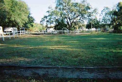$460,000
5 acres, Tampa,Fl. HORSE BARN AND HOUSE