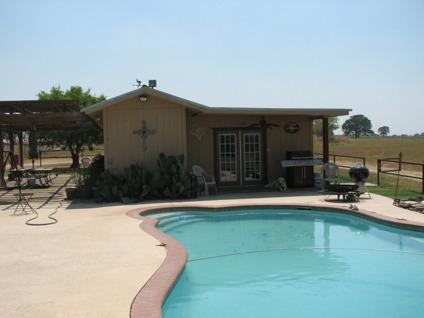 $465,000
3 BR 3 BA Ranch Home on 25 Acres with Pool & Pool House