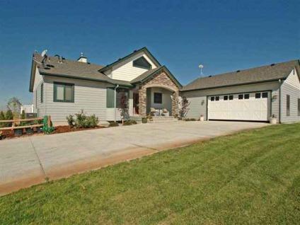$469,900
Beautiful Country Home features a wrap-around Trex deck, complimented by