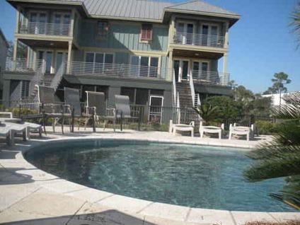 $489,000
Fabulous duplex located on Cotton Bayou with LARGE boat slips!!