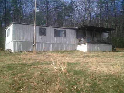$56,500
This little Mobile home is furnished, situated on 5 acres of mostley wooded