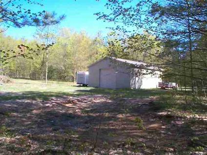 $57,900
Interlochen, Beautiful woods line both sides of the approach