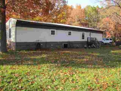 $59,900
3BR,1 and 1/2 Bath Mobile Home w/ recent add on, sliding glass doors open onto