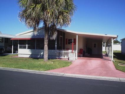 $59,900
Double-Wide Mobile Home in South HIll in Zephyrhills, Florida with Land