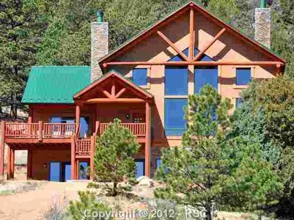 $694,900
A Colorado custom built log accent home on 45 acres with Pikes Peak views from