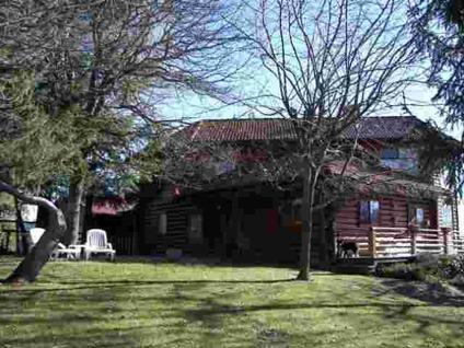 $720,000
White City 3BR 2BA, Very private, well constructed log home