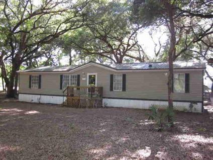 $72,500
Old Town, Beautiful oak trees surround this 1998 4BD/2BA