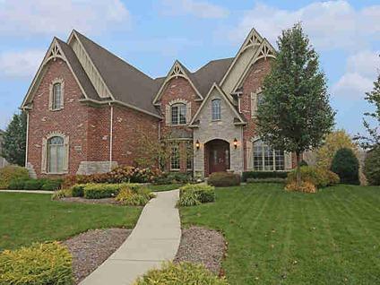 $749,900
Exquisite Custom Designed Home Backing to Pond & Forest Preserve Offering
