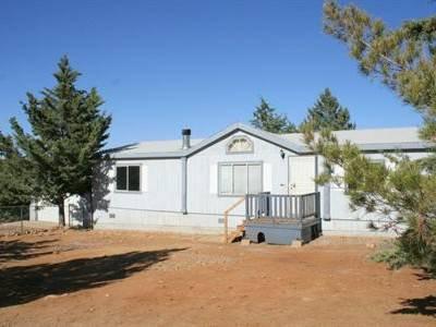 $79,900
4 Bedroom Home on 2 Acres Bordering National Forest