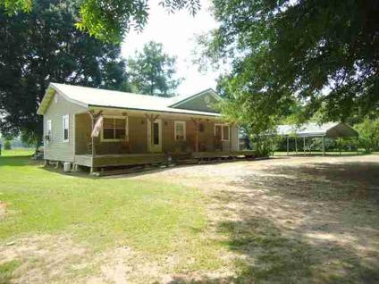 $79,900
Adorable, cottage style home on 1 acre. Features include large front porch
