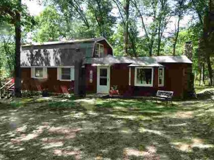 $79,900
Pretty housesite on 14 acres sitting back in the mature hardwoods.