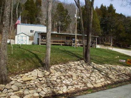 $80,000
5 Acre Hillside Manufactured Home Poarch overlooking Laughery Creek