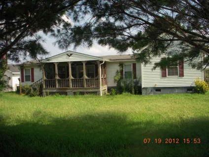 $84,500
Barco 4BR 3BA, Down a gravel road shaded by tall country