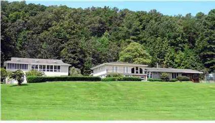 $875,000
Spectacular country estate situated on 14 acres with a private lake near The