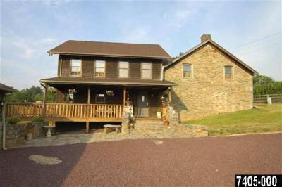 $899,950
New Freedom 3BR 2.5BA, 71 ACRE RETREAT Original stone home