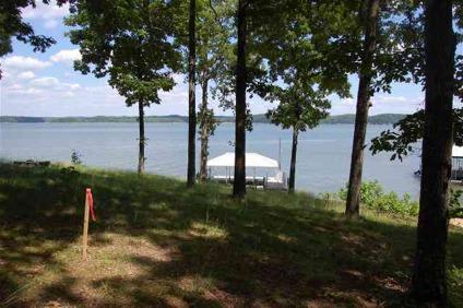 $95,000
New Concord, This wooded waterfront lot may be just what