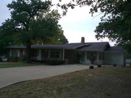 $98,000
This home is on a dead end street, has big established shade trees and is big