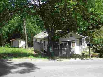 $9,000
NICE LOT NEAR TOWN WITH LITTLE FIXER-UPPER. Small home needs lots of work