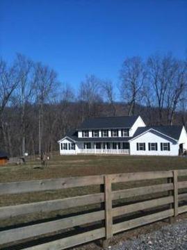 Beautiful 94 Acre Farm with lake- Newer home/barn. Fenced and X fenced