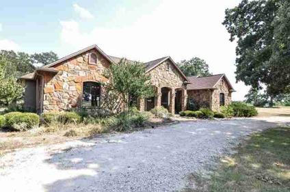 Fantastic rare find! Enjoy country living in a new home nestled on 100 acres.
