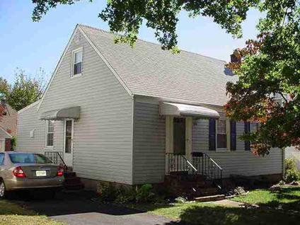 For Rent Move-In condition cape cod on quiet residential street with expanded