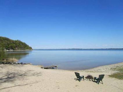 JUST LISTED* - Estate size parcel on East Grand Traverse Bay!