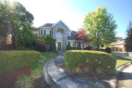 Roseville, This Gorgeous executive home is a 5 bedroom