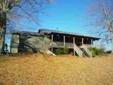 $135,000
This lovely rustic home, nestled into the private tranquility of the TN