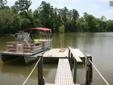 $138,000
Adorable Lake Front Home, With large Lot. Nice Boat Dock, And 2 Stall Carport.